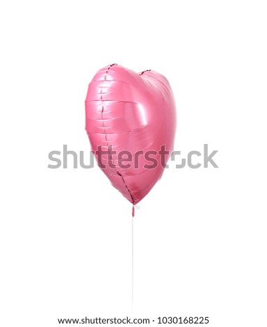 Single big red heart balloon object with smile for birthday or valentines day isolated on white background