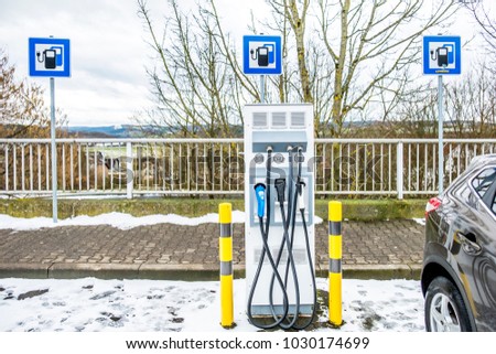 New charging stations at a service station in Germany, Europe Royalty-Free Stock Photo #1030174699