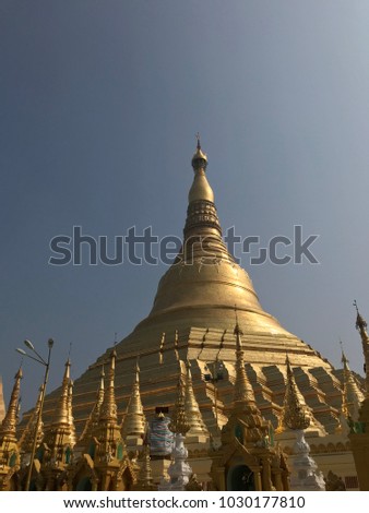 Golden pagoda in Buddhist temple, beautiful historic place in Myanmar