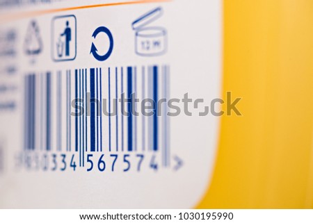 Barcode numbers with garbage symbol and symbol for recycling on a plastic product in a store