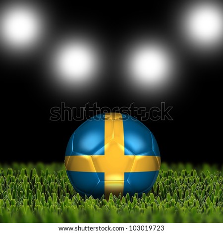 Soccer ball on grass against black and spotlight background. Country Sweden