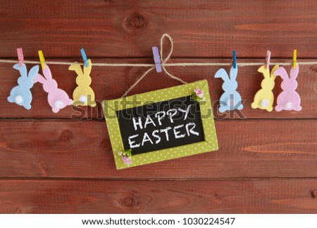Cheerful decoration for easter on a rustic wooden background