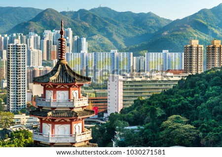 Pagoda at Po Fook Hill Columbarium and Sha Tin skyline in Hong Kong, China