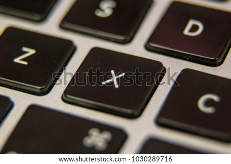 X Keyboard key button press type close up macro desktop laptop computer black silver detail technology blog write letter alphabet