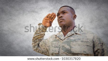 Digital composite of Soldier saluting against white wall with grunge overlay