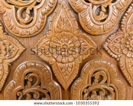 Golden wood craft decoration in Buddhist temple, beautiful pattern for decoration