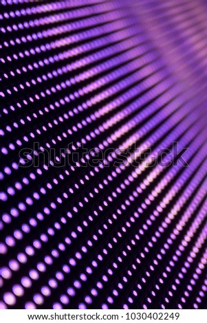 Bright colored LED video wall with. close up background with shallow depth of field