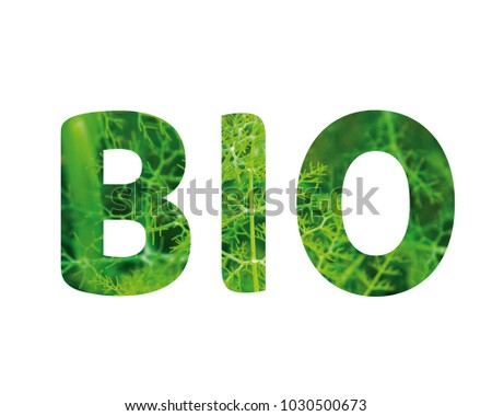 Isolated word BIO with green grass and white background