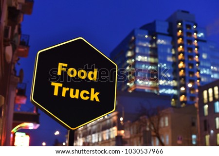 sign board of Food Truck on background night street