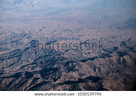 The mountain from above. This is the mountain valley name  Hindu Kush also known in Ancient Greek as the Caucasus Indicus , it is located in Afghanistan I was shoot this picture from the airplane 