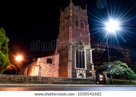 Long exposure picture of church in the midle of town