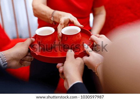Traditional Chinese wedding day tea ceremony cups and tray with the symbol known as "Double Happiness"