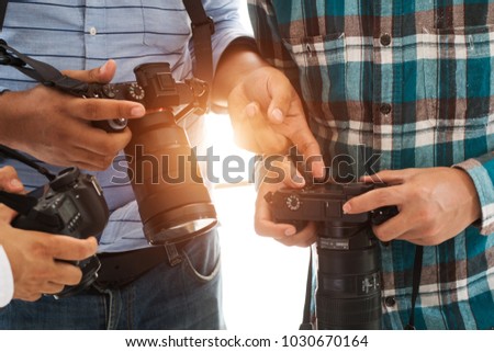 Photographers are viewing the camera,photographer
