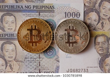 Bitcoin on Philippines Peso Banknotes Background