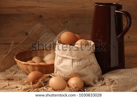 Fresh eggs in a Kraft paper bag.