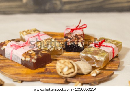 many granola bars with nuts and marmelade