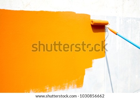 rollerbrush and orange background.