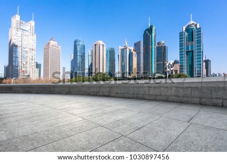 empty marble floor with panoramic cityscape