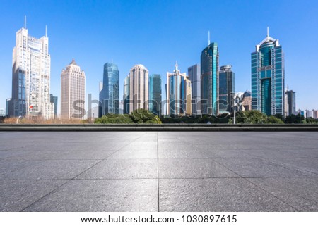 empty marble floor with panoramic cityscape