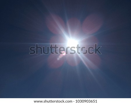 Natural sun flare with blue sky background