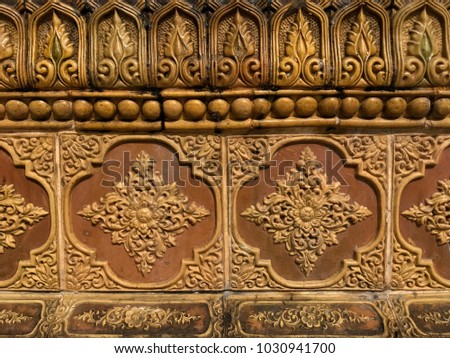 Golden craft stucco decoration in Buddhist temple, beautiful pattern for decoration