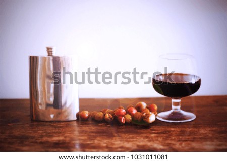 Cognac In The Glass With Grapes 