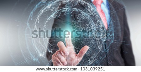 Flying earth network interface activated by businessman on blurred background 3D rendering