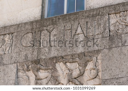 City Hall sign on the front facade of building