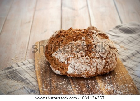 Homemade whole wheat irish soda bread Royalty-Free Stock Photo #1031134357