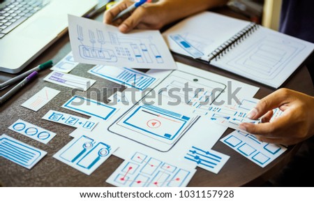 ux designer workspace creative Graphic planning application development for web mobile phone . User experience concept .