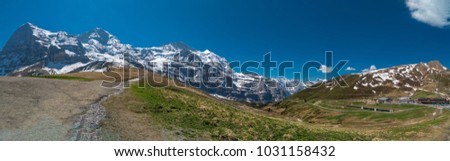 Spectacular view of the mountain Jungfrau and the four thousand meter peaks in the Bernese Alps from Greendeltwald valley, Switzerland Royalty-Free Stock Photo #1031158432