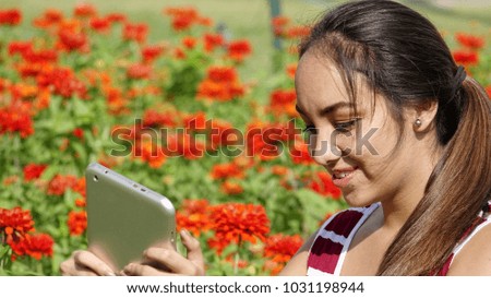 Female Teen Girl Using Tablet