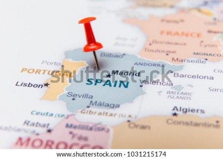 Map of Spain with a red pushpin. Royalty-Free Stock Photo #1031215174