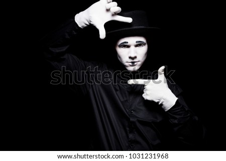 mime pretending photographing isolated on black