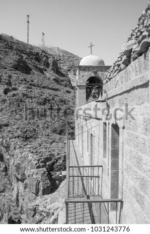 Black and white  picture of Monastery of the Temptation and the mountains located in Jericho, Israel