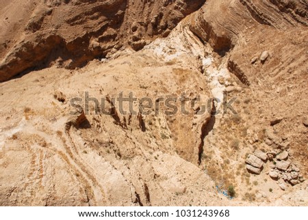 From top to bottom picture of dry valley at Mount Temptation in Jericho, Israel