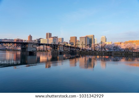 Skyline of Portland Oregon with Will laminate River in foreground