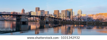 Skyline of Portland Oregon with Will laminate River in foreground