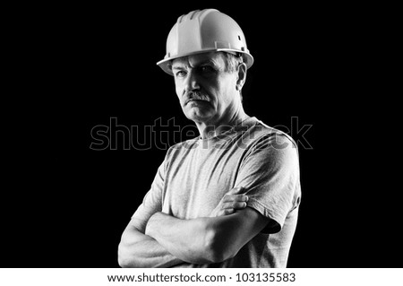 Black and white portrait of a senior constructor