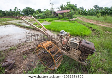 hand held tractor for plow rice paddy field