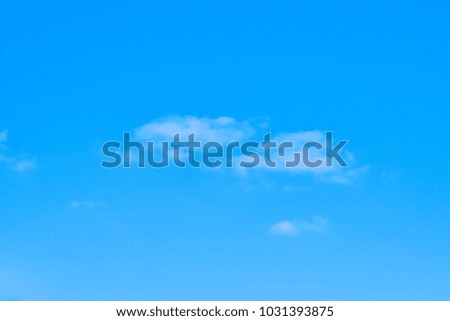 Blue sky with a light cloud, background