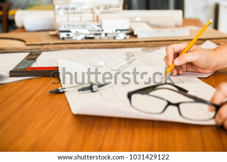 Architect or engineer working in office, Construction, Engineering tools Architects working with drawing sketch project plan blueprint. Corporate Achievement Planning Design Draw