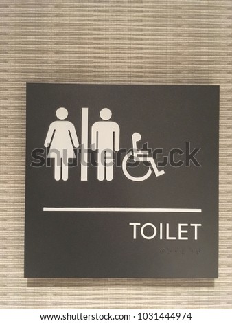 Toilet Sign with male icon, female icon and wheelchair icon