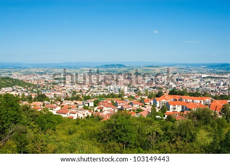 Panorama city of Clermont-Ferrand and Auvergne Volcano national park, France. Royalty-Free Stock Photo #103149443