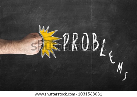 Beating problems. fist and inscription problems on chalkboard.