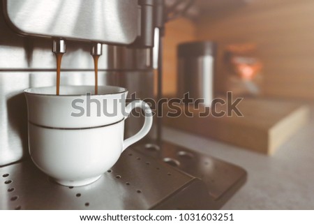automatic espresso machine making coffee