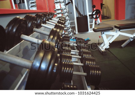 Sport, bodybuilding, lifestyle concept with vignetting effect. Abstract blur fitness gym background