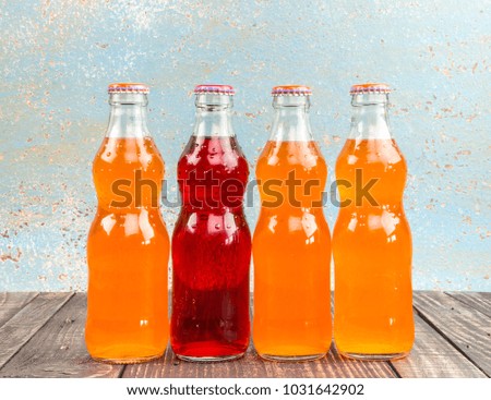 variety of soda bottle on the wooden background
