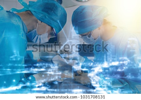 Couple of doctors doing the operation
