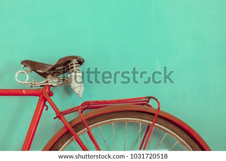 Parts of a vintage bike. Retro bike in pink color
